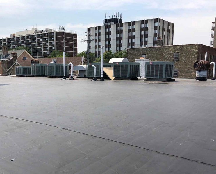 Wisconsin Roofing LLC Milwaukee Commercial Roofs EPDM Rubber Roof ISO Insulation Top