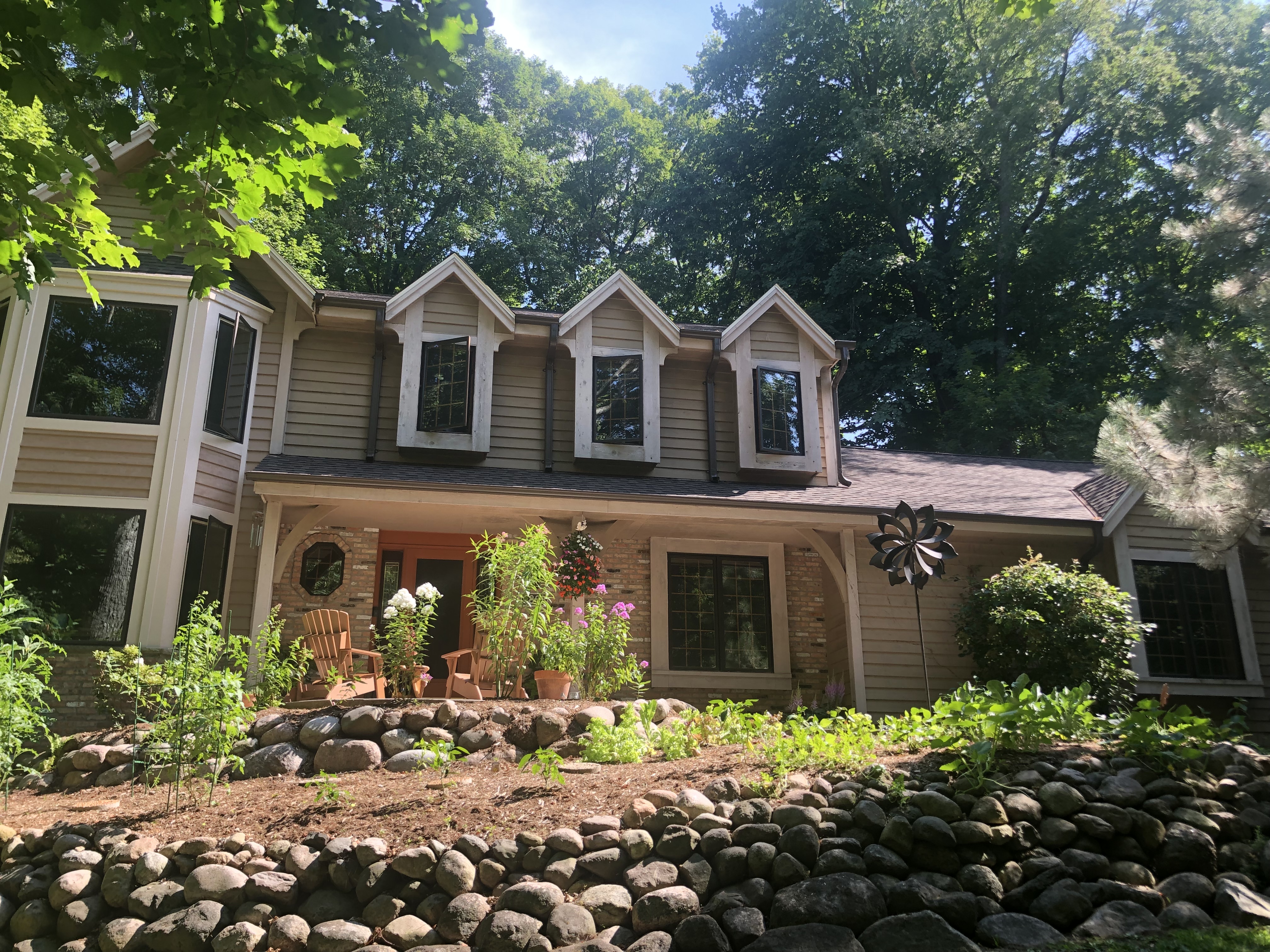 Wisconsin Roofing LLC | Brookfield | Upgraded CertainTeed Landmark PRO Shingles | Burnt Sienna | New gutters | New RAINDROP Leaf Protection | Extensive Landscaping Front