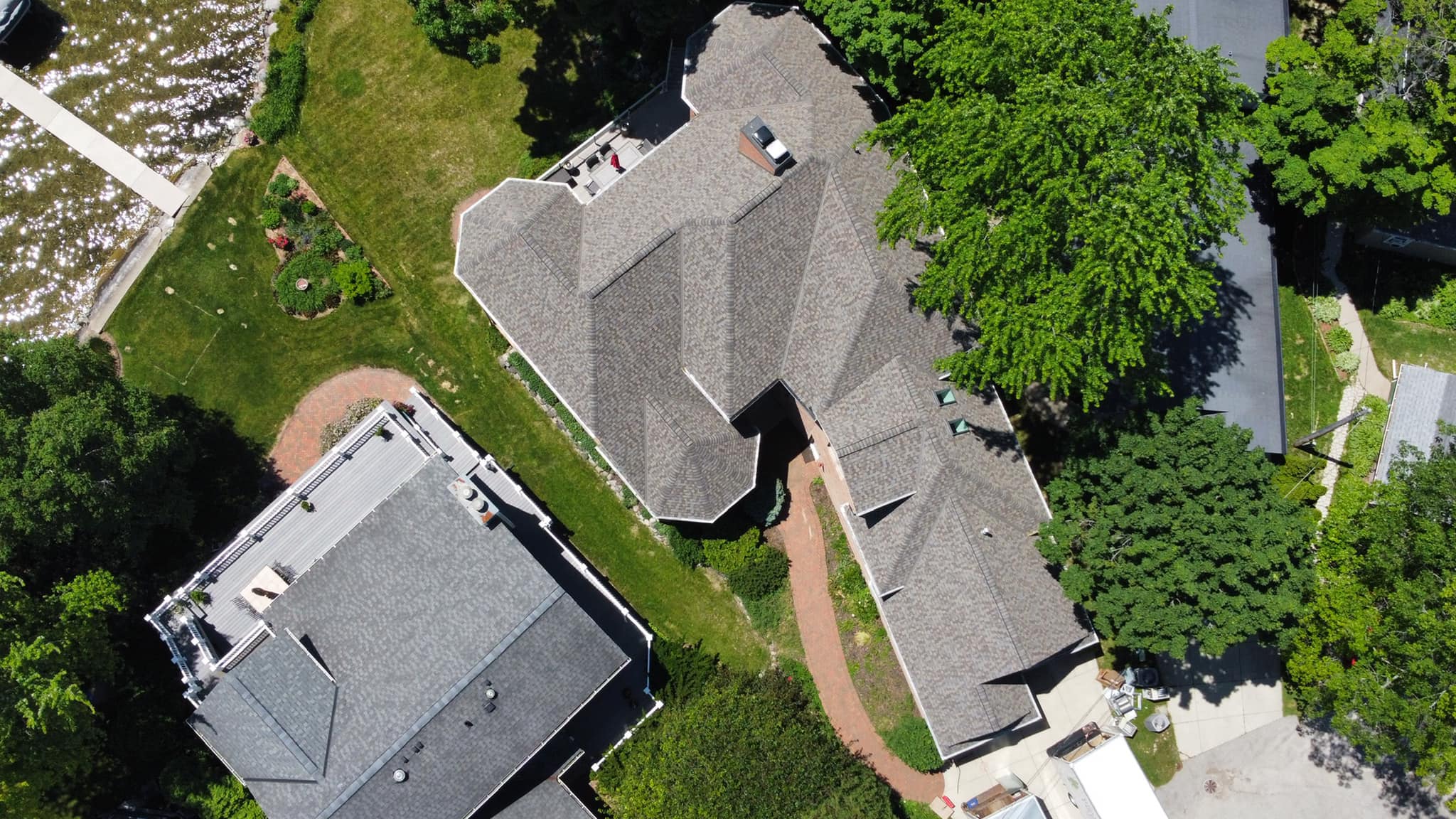 Wisconsin Roofing LLC | Hartland | Lake Nagawicka | CertainTeed Northgate Climate Flex | Weathered Wood | Drone